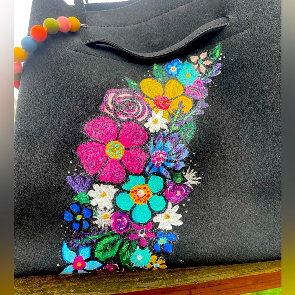 Handcrafted and hand painted purse
